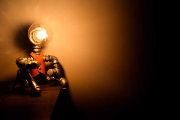 Photo industrial iron pipe robot desk lamp